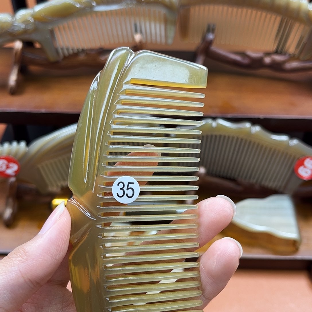 永***人牛角纯手工制作的牛角梳