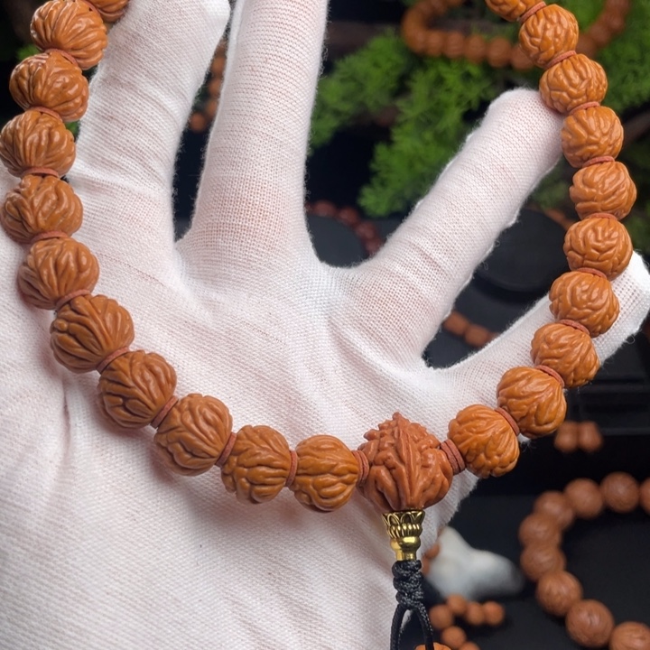 毛***娘桃核吊坠精品手持