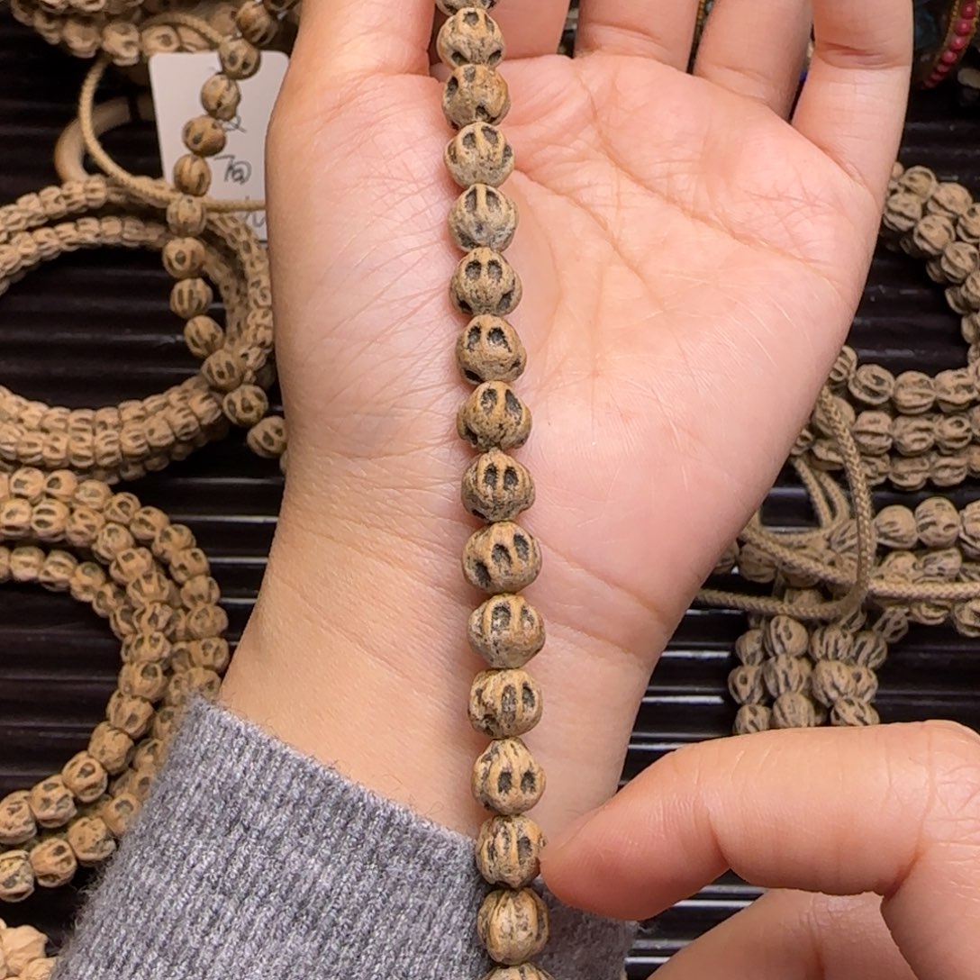 柏香籽/百香籽吊坠似**识