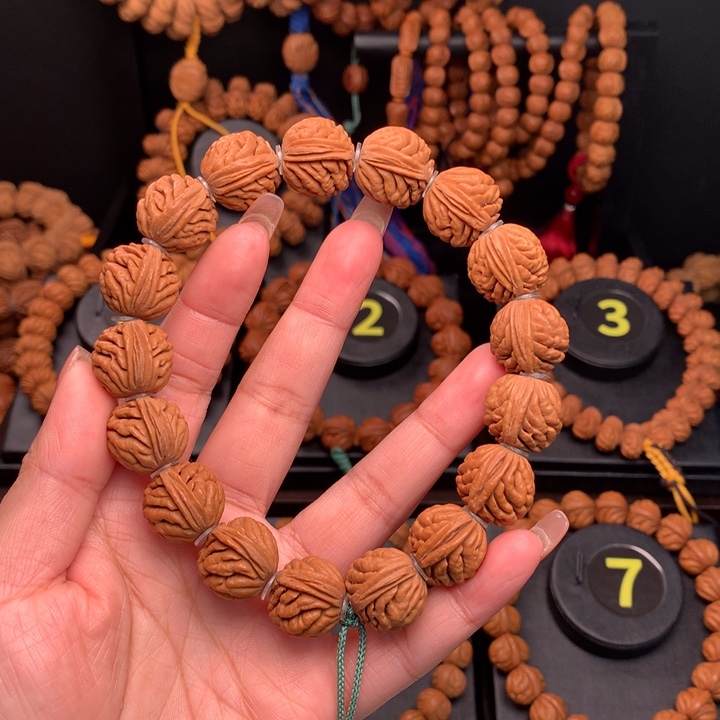 桃核吊坠1.7元宝刺龙手串