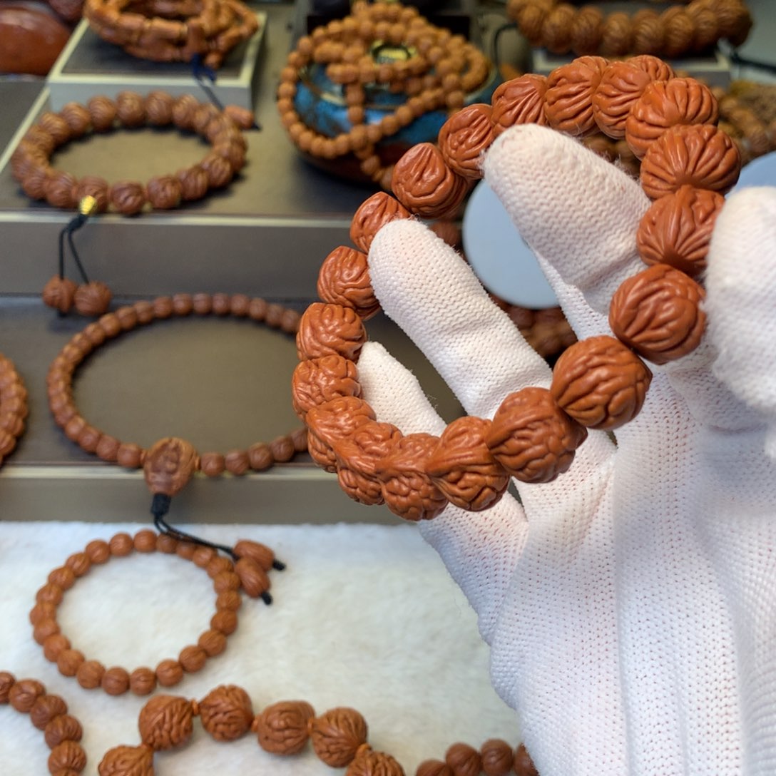 邓***哈桃核手串秦岭龙纹