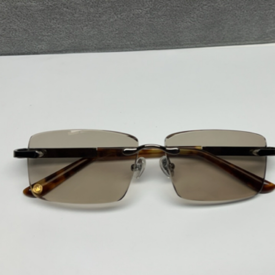 石头眼镜男士无框商务款高清偏光养目太阳镜