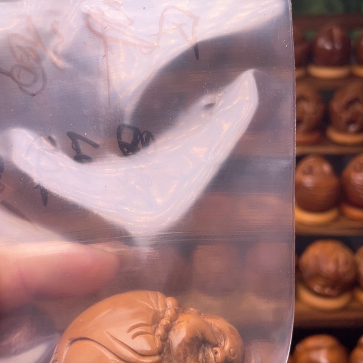 橄榄核把件风**静橄榄雕刻