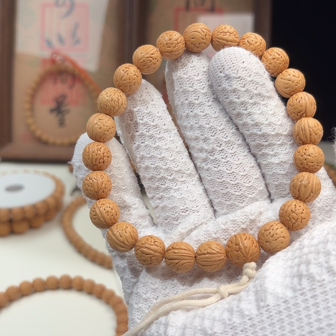 洲***洲桃核手串1.1加「超级圆」野生桃核手持