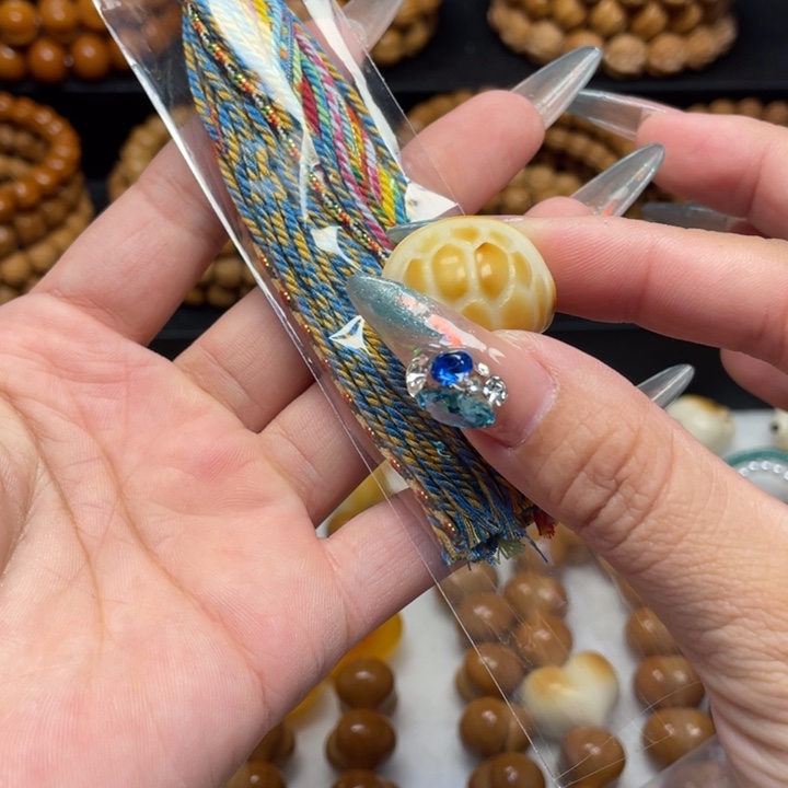 T***菜吊坠猴头核桃富甲流苏