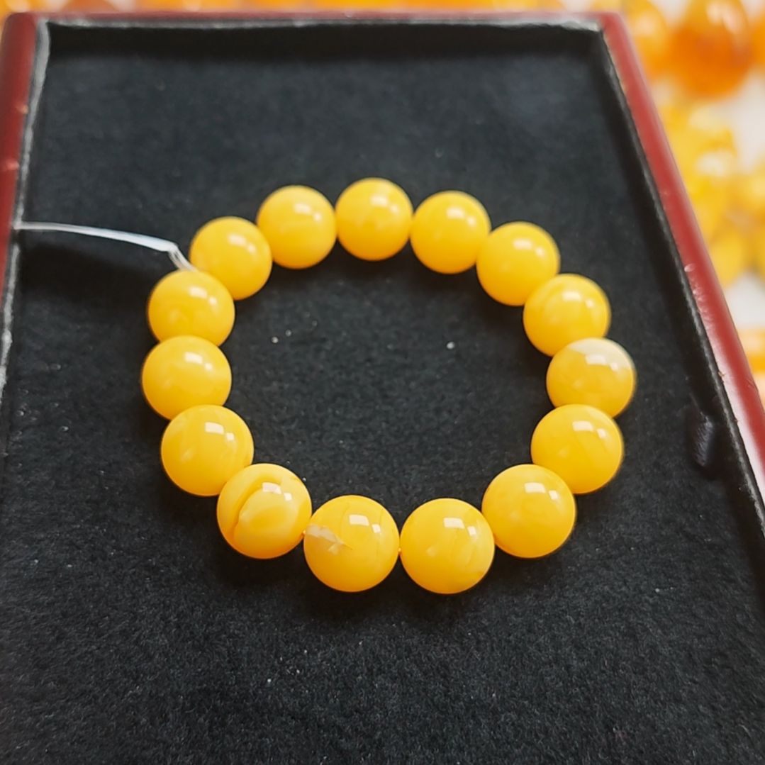 手串蜜蜡未镶嵌同料手串14m。