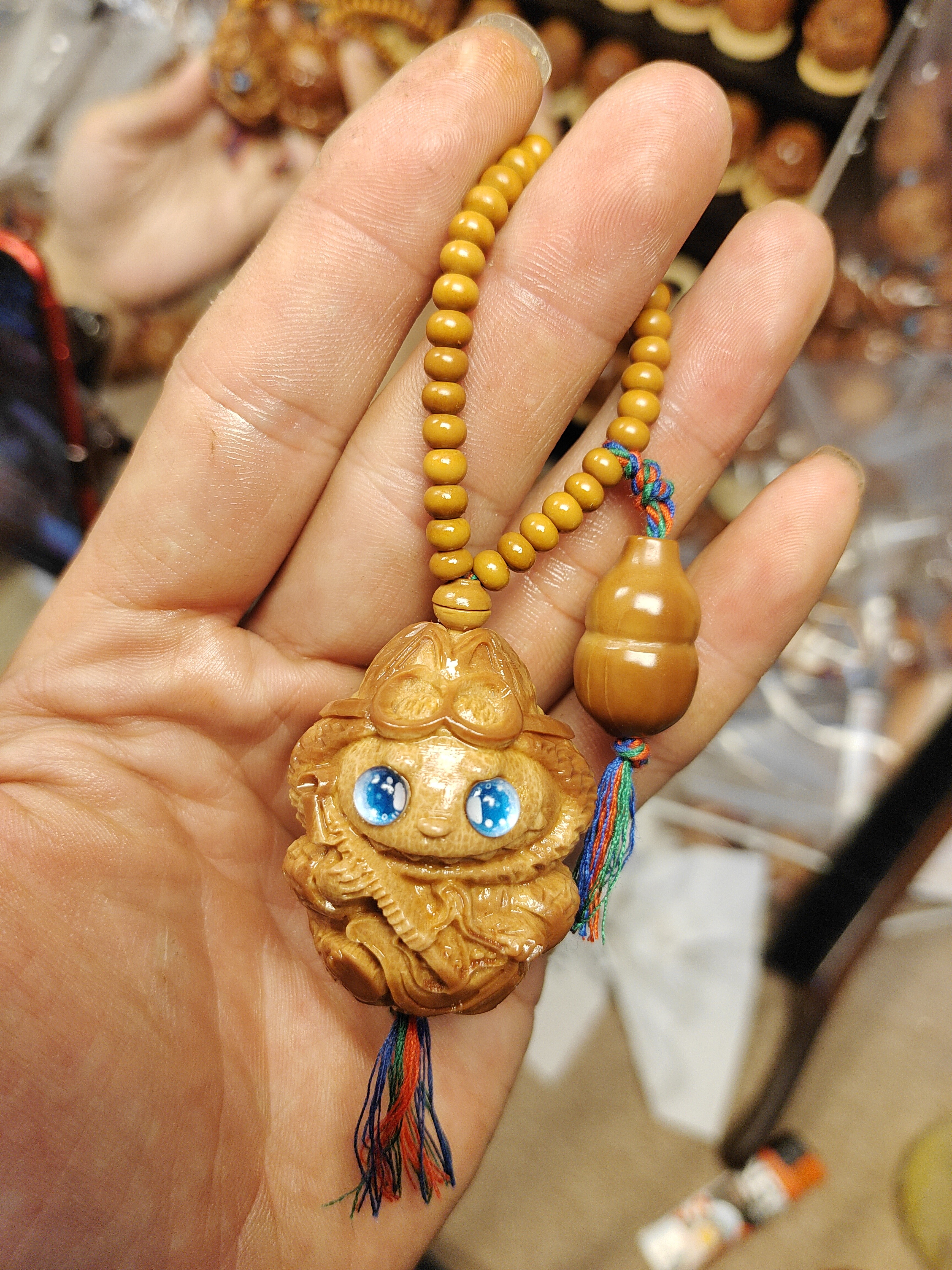 潮流布布橄榄核手把件