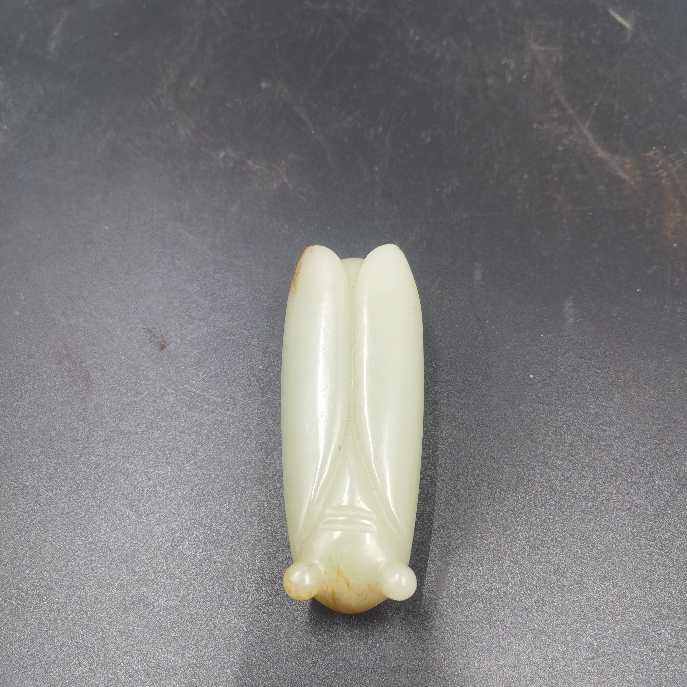 和田玉挂件玉蝉，玉质细腻。