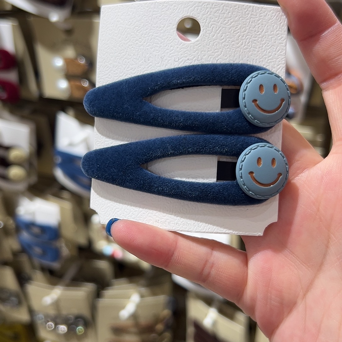 布艺非金属笑脸丝绒拜拜夹