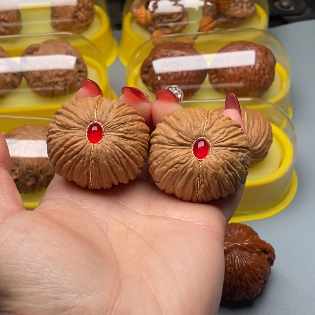 文玩核桃把件简***。40猴头元宝