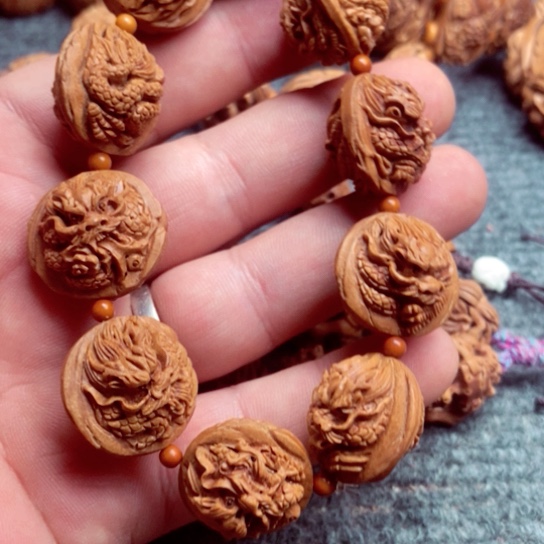 文玩核桃手串干*学龙纹桃核双面九龙手串