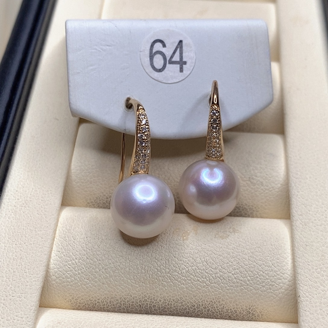 灵***@淡水珍珠耳饰银S925镶嵌