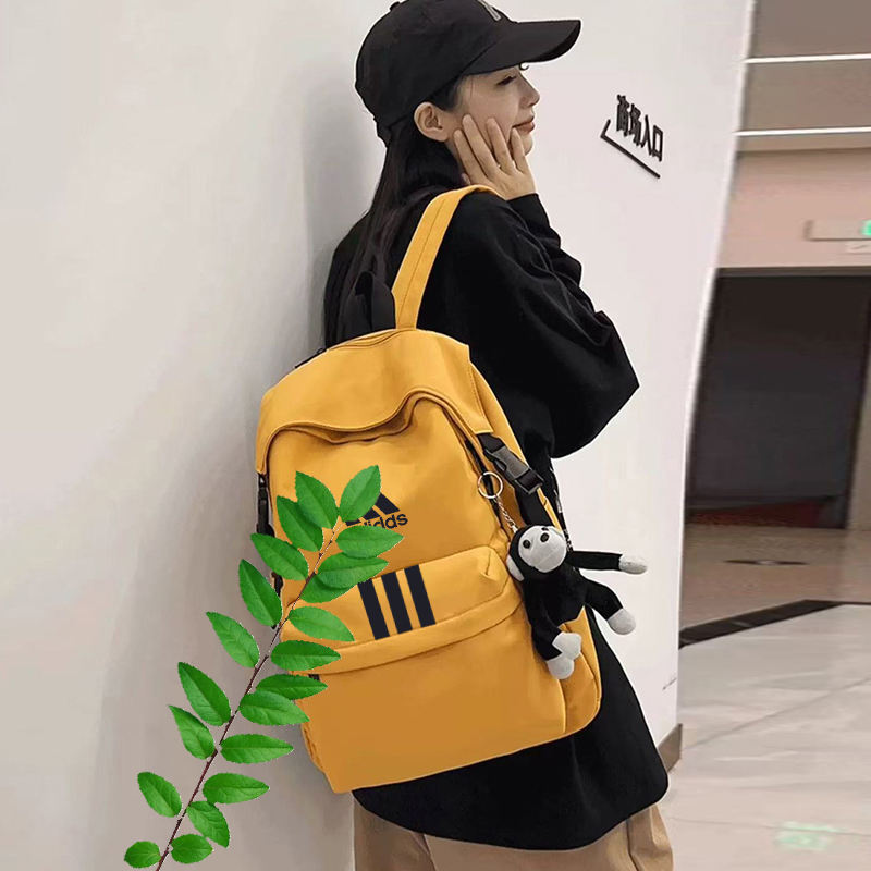 2025年情侣男女双肩包款户外休闲运动书包背包黄色款