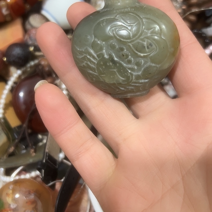 放***…橄榄核吊坠民俗文化的艺术品