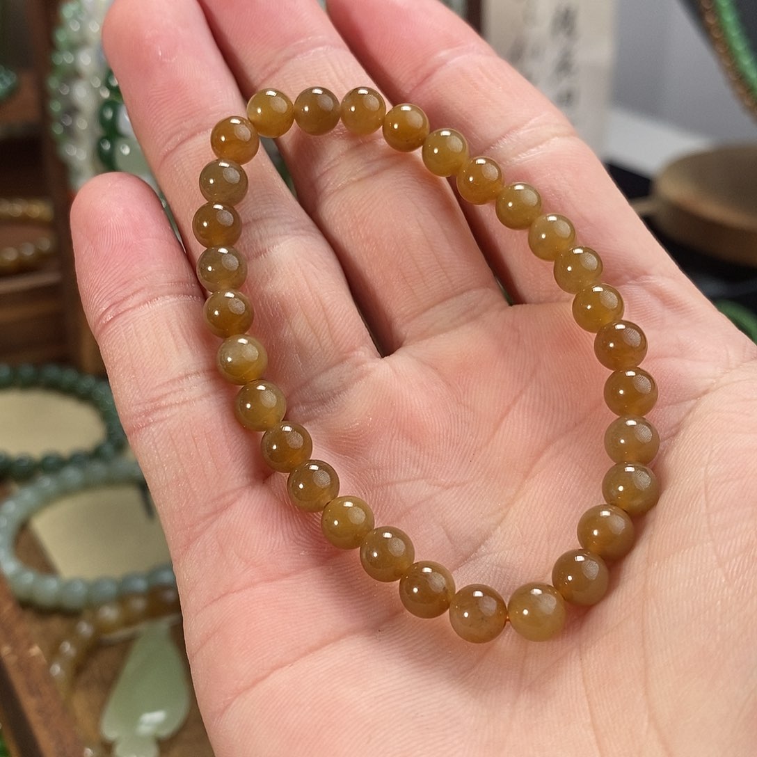 和田玉手串未镶嵌乌**子且末糖单圈有包容