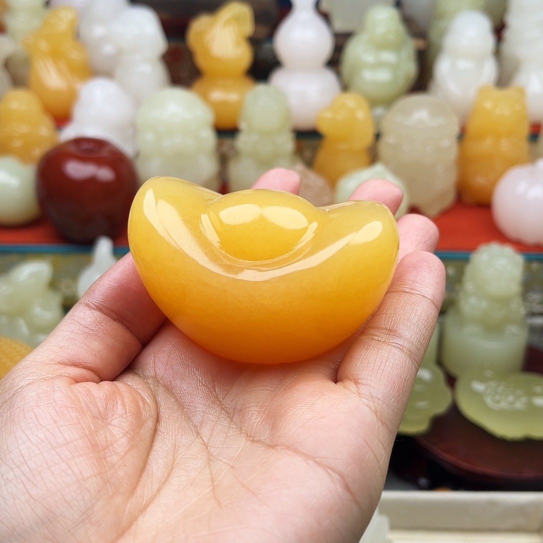 红***桃石材元宝手把摆件