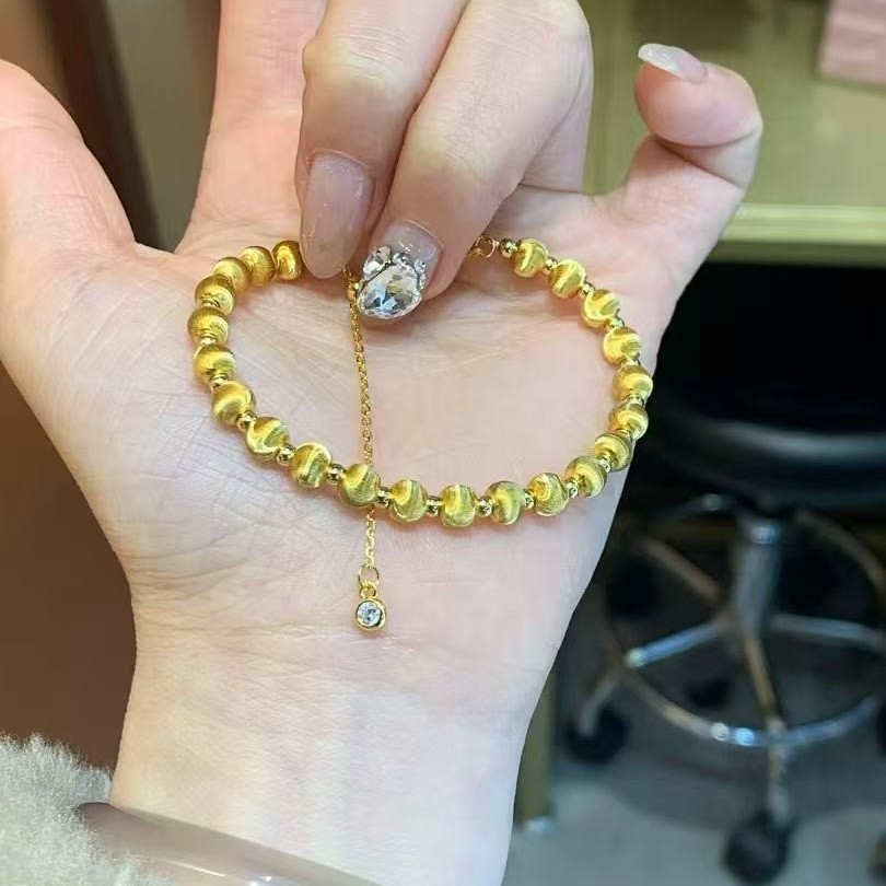 925银合成锆石手链 纯银S925猫眼镀金手链金色可调节抽拉珠珠