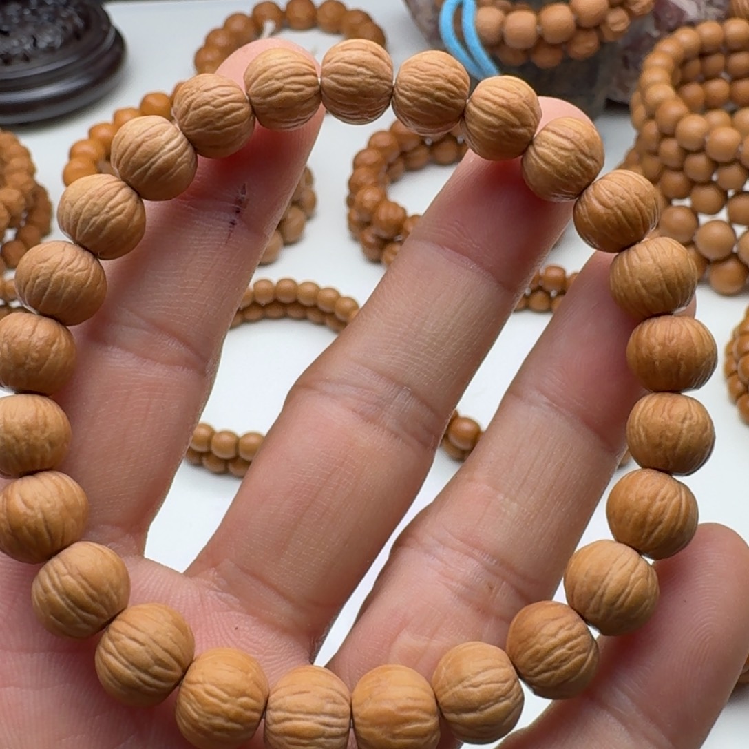 L****手串猴头核桃10+雕刻凤羽