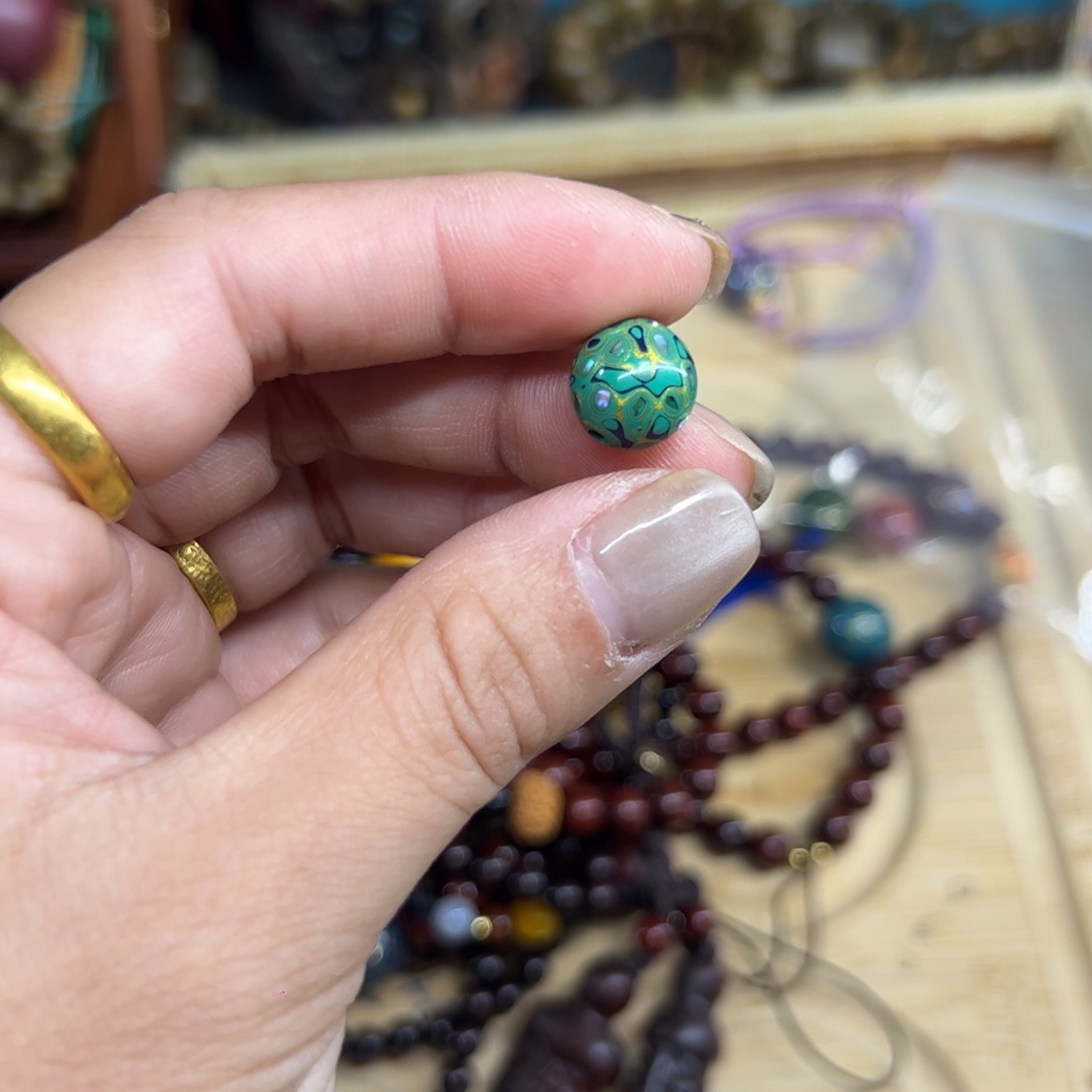 宫****无事牌维腊木（绿檀）