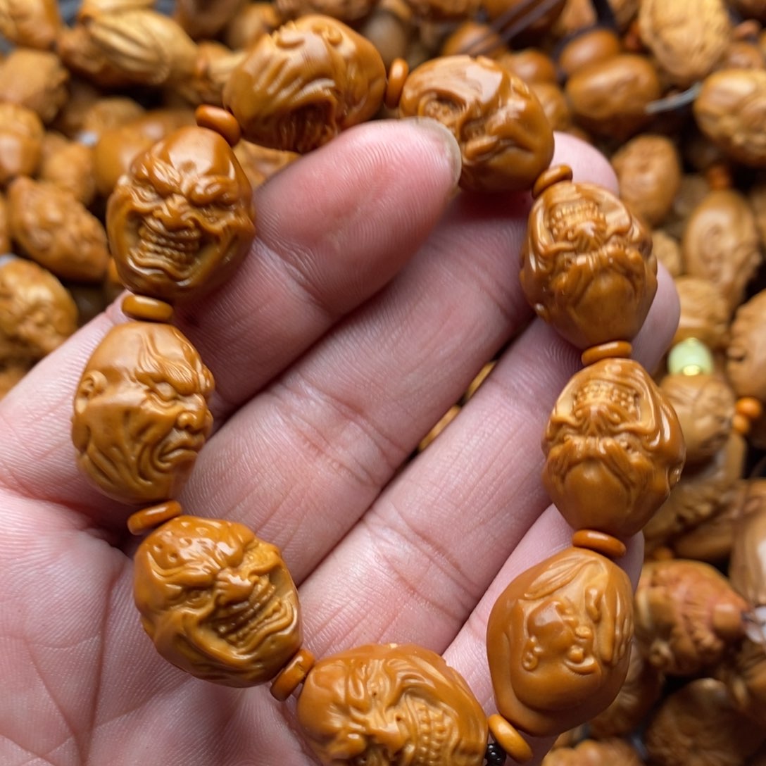 橄榄核手串恶僧失望