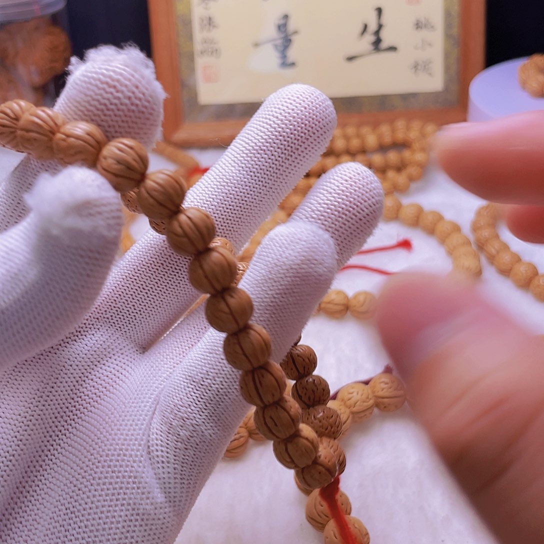 飞***桃木9+野生桃核手持宽齐