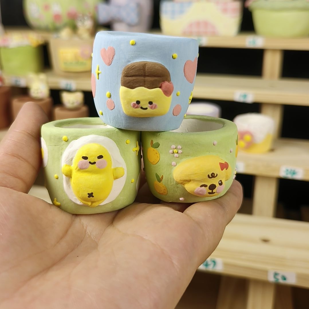 茉***）懒蛋蛋小狗巧克力拇指盆