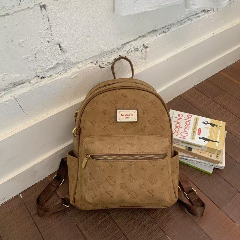 秋冬款新款可爱焦糖小猫压痕大容量双肩包