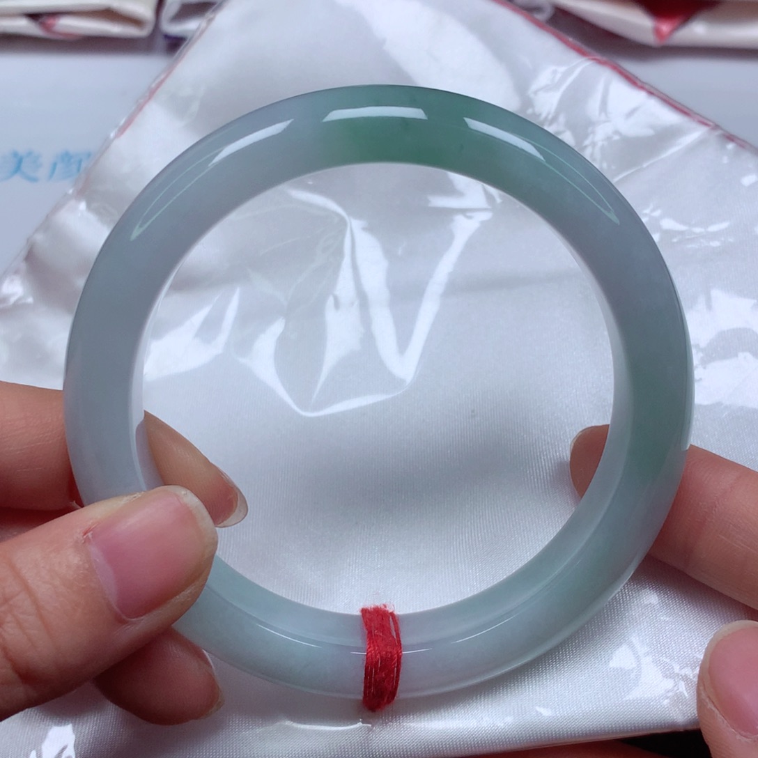 翡翠未镶嵌手镯冰蓝底飘花果冻胶5960