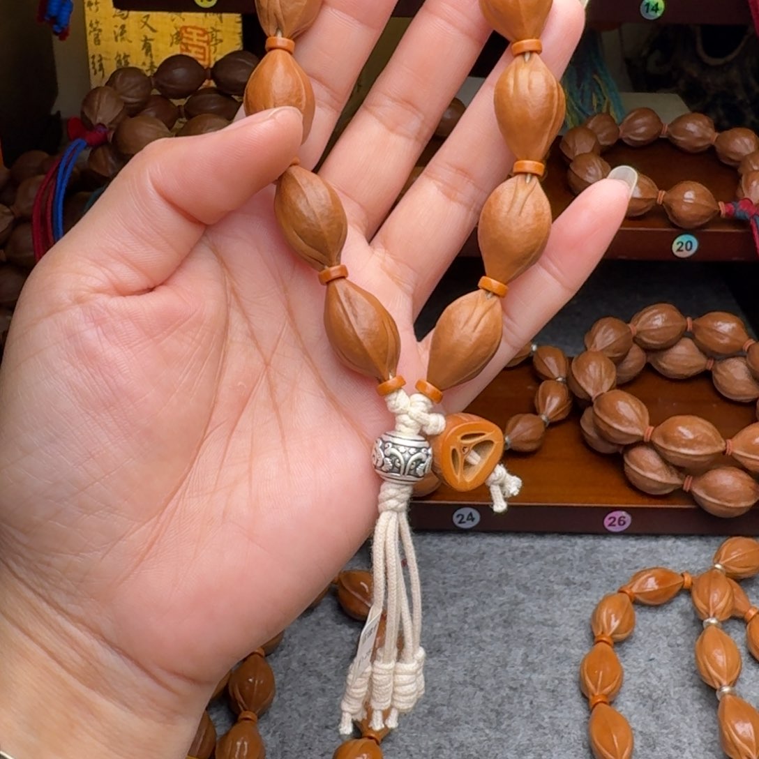 橄榄核手串文****515*24三面佛 正宗梅林铁核
