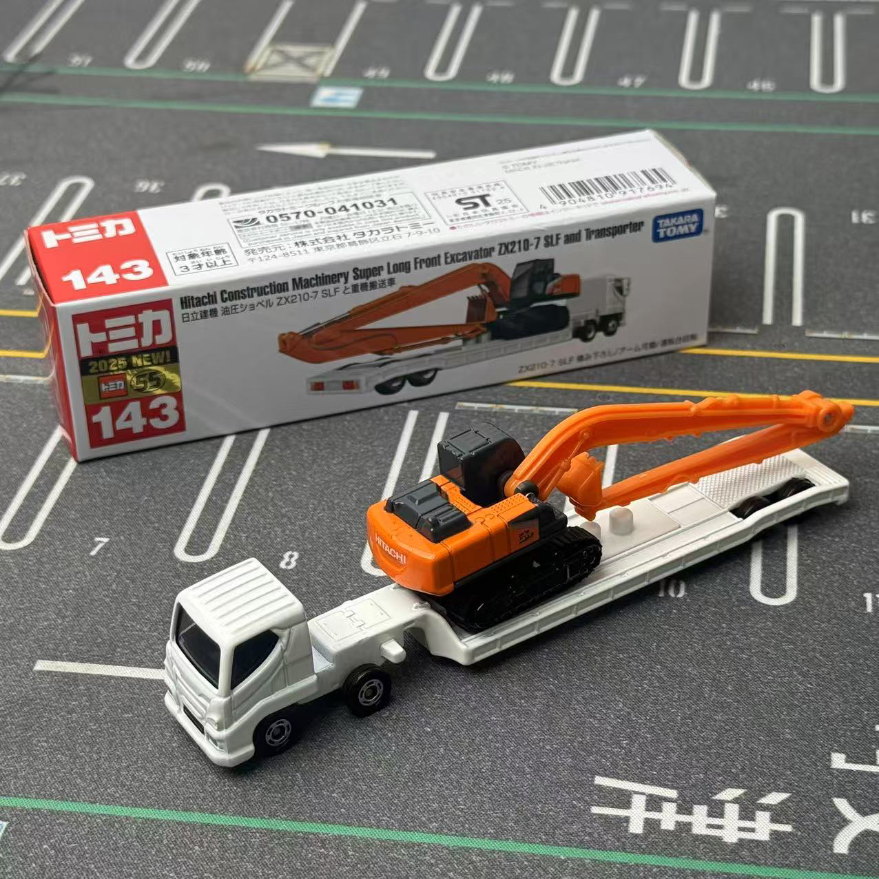 25年3月港版新车贴TOMY多美卡合金玩具车长款日立建机143号搬运车