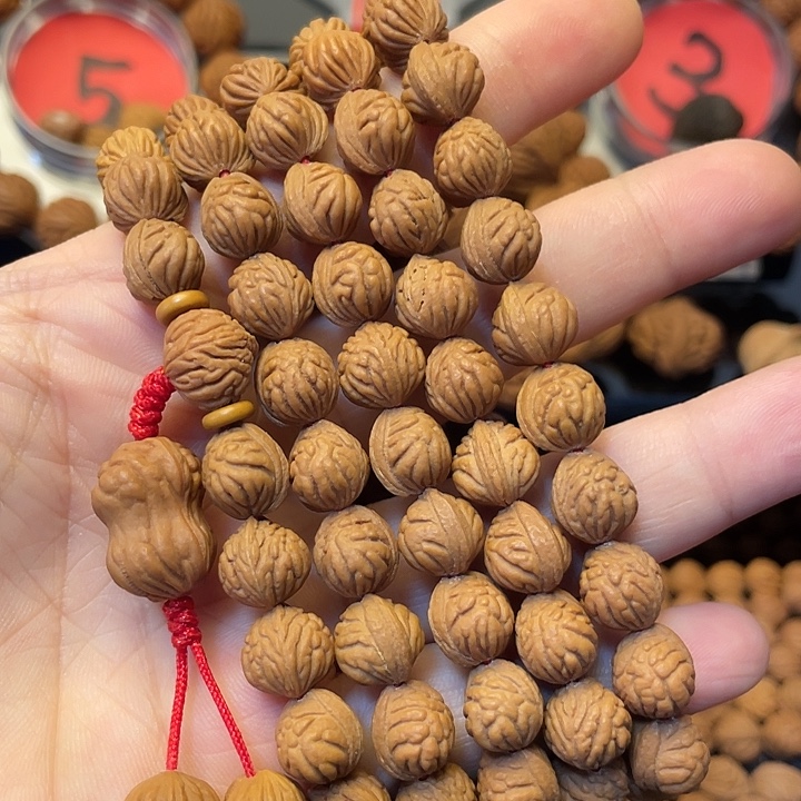 向***生桃核把件小金豆脖挂10小115颗