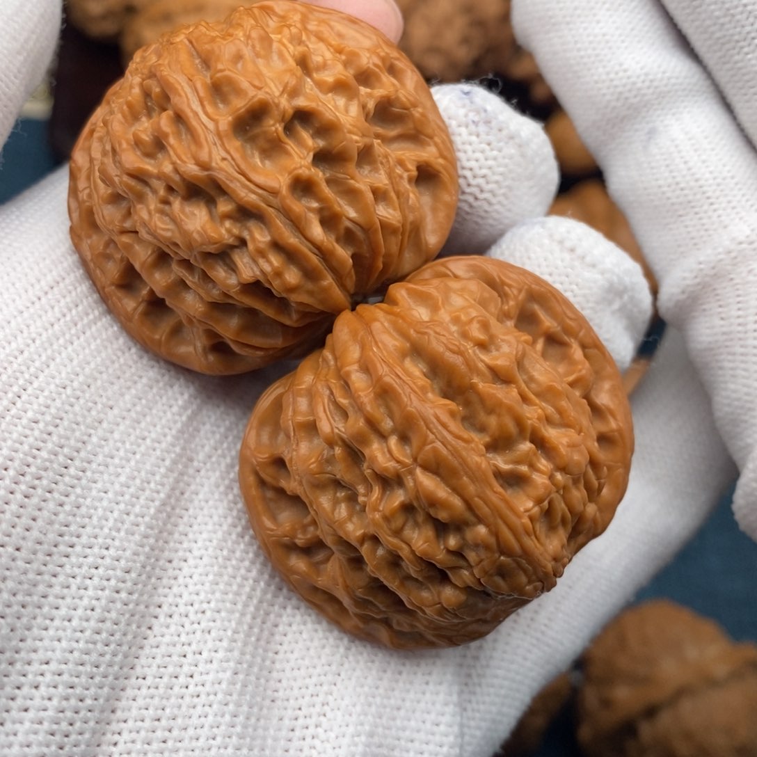 文玩核桃把件40.8红皮球磨