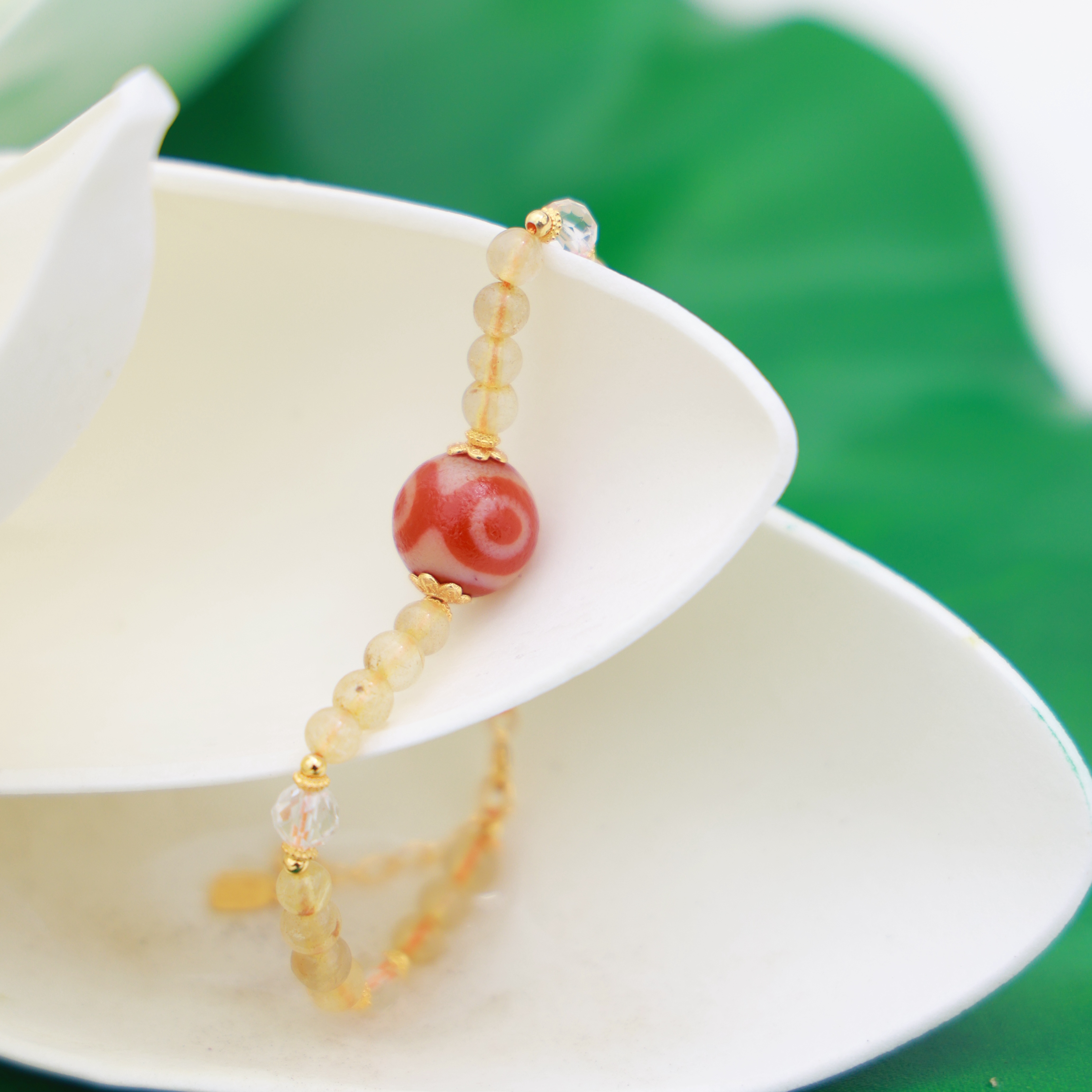 转过山 红肉三眼天珠玛瑙发晶手链（拉萨直发）DU250515107