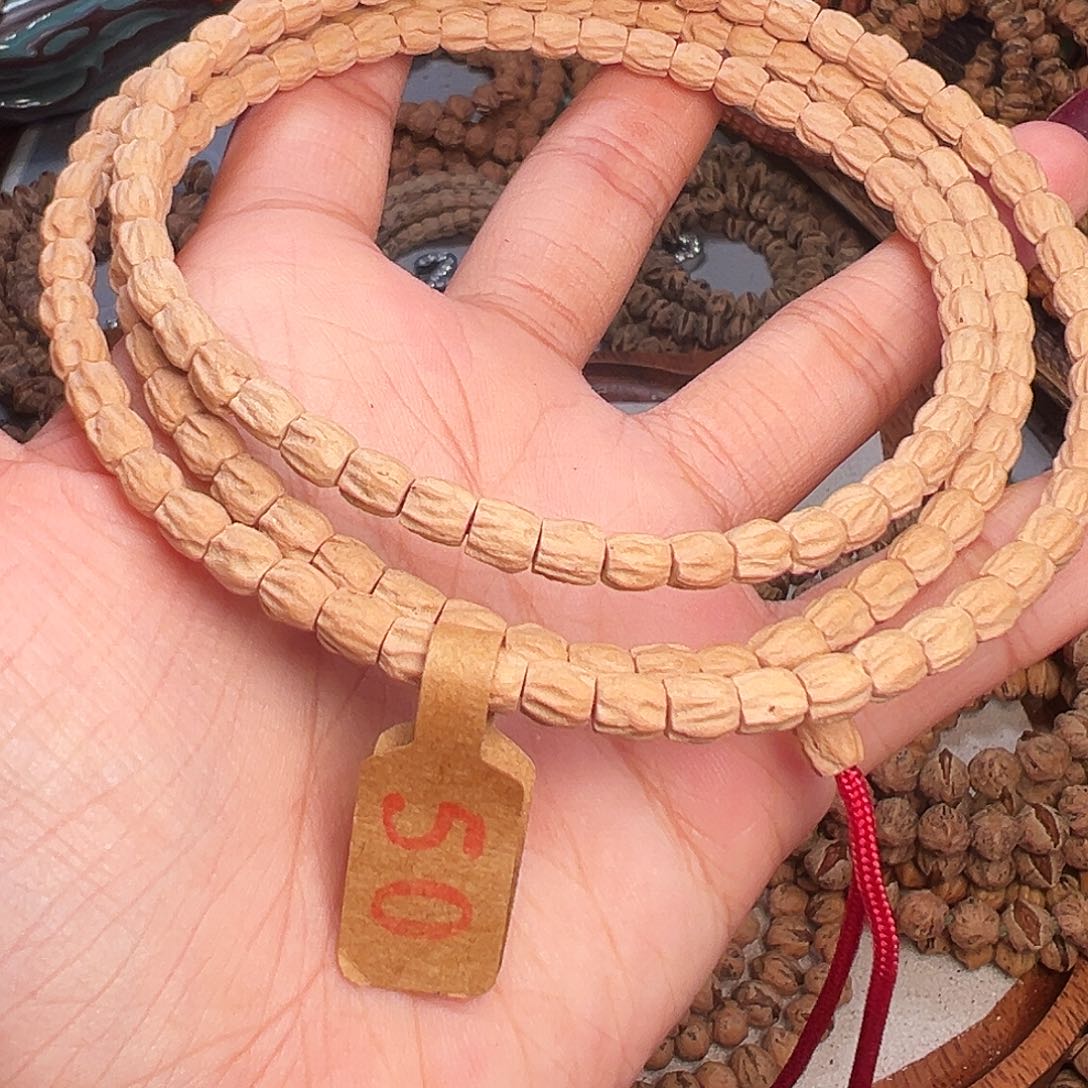 隆***源柏香籽/百香籽吊坠