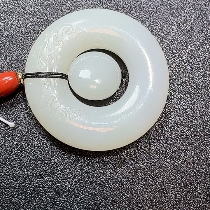 陌***。和田玉未镶嵌颈饰