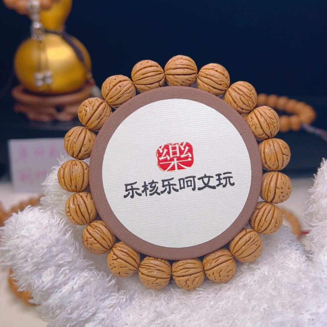 桃核手串《**》1.3加肥脐三道金单圈