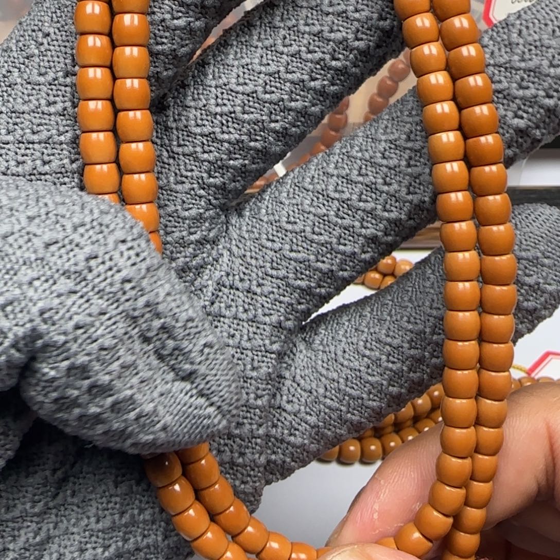 橄榄核手串老挝5.8mm三花面无白直切108