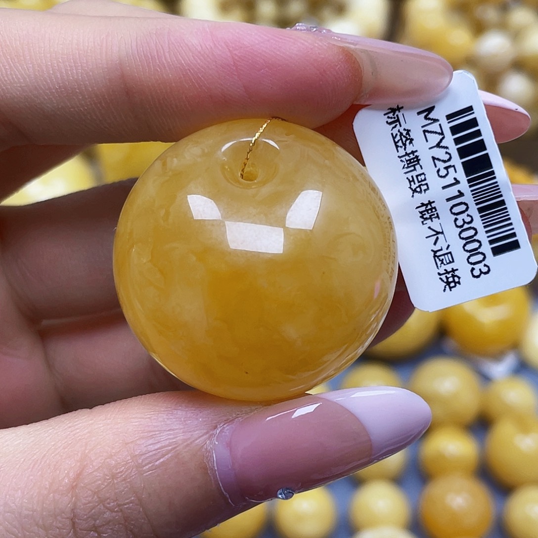 蜜蜡未镶嵌裸石32.3*20.0mm.瑕疵