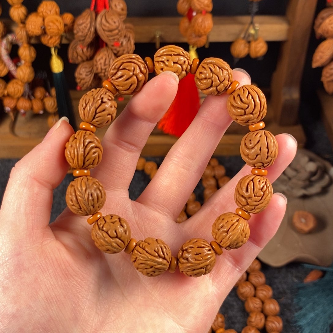 吊坠桃核桃枭手串