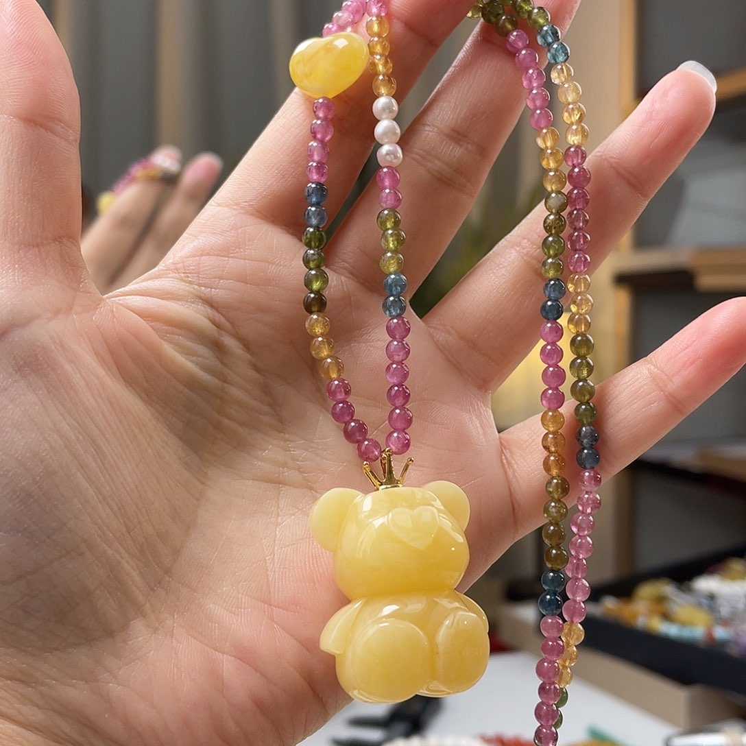 琥珀裸石18K金镶嵌蜜蜡吊坠