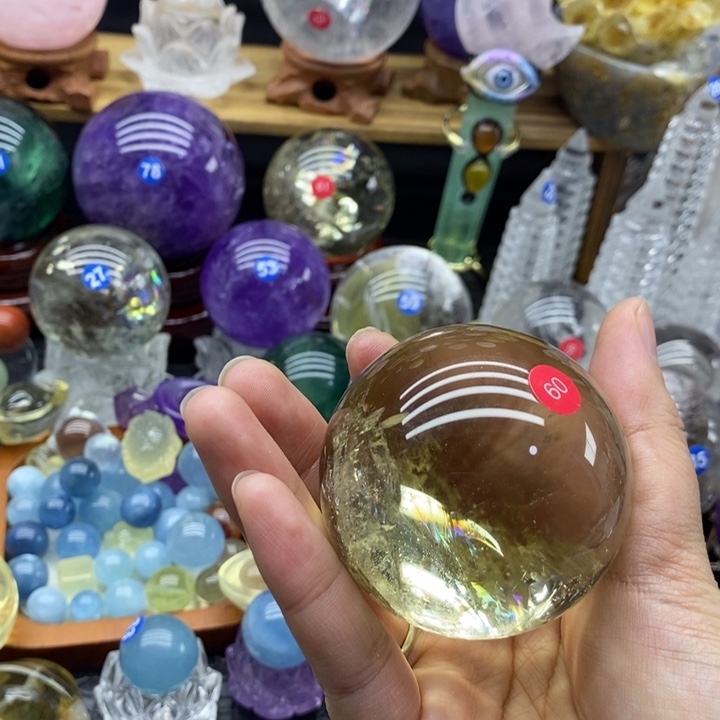 摄***9石材天然黄水晶球