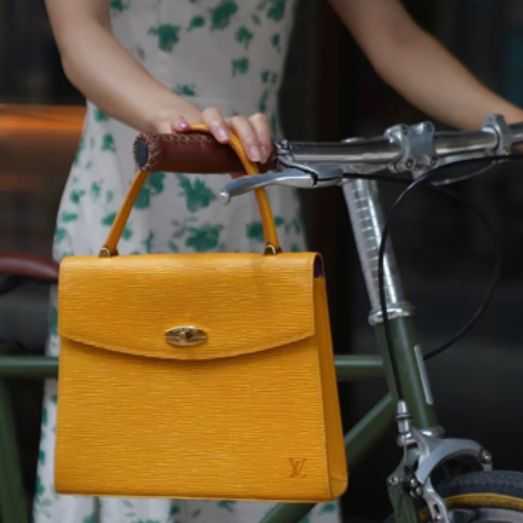 95新 LouisVuitton/路易威登 LV黄色水波纹手拎凯莉