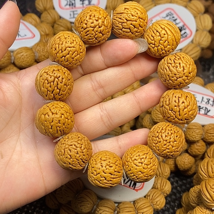 萱***爸手串桃核白月光22