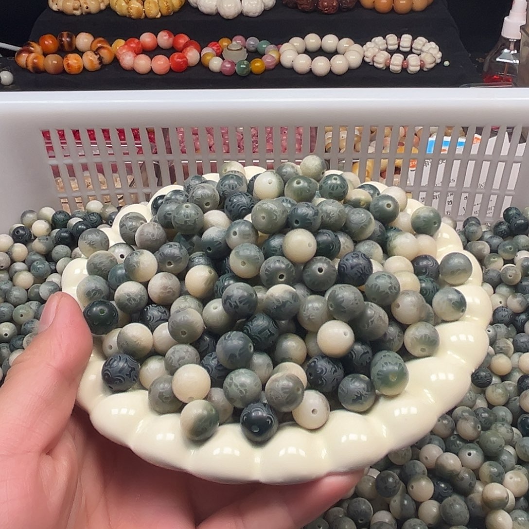 菩提根/象牙果手串200颗混尺寸六字烟雨飘花