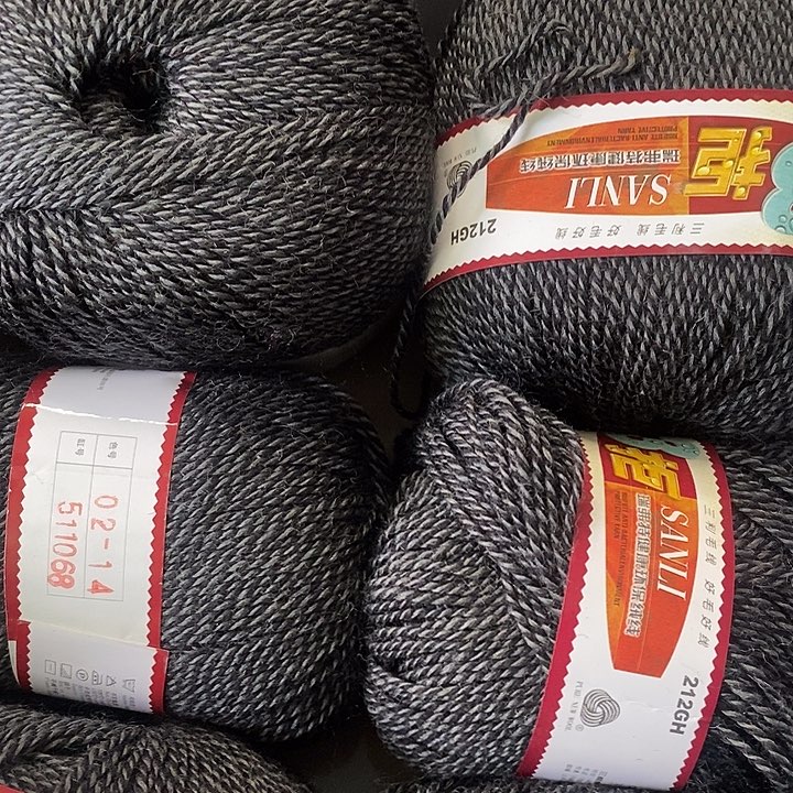 花***落羊毛三利三句黑灰色1.2斤价格