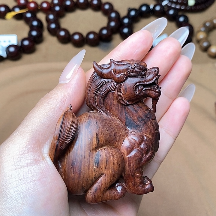 黄花梨/降香黄檀手把件麒麟