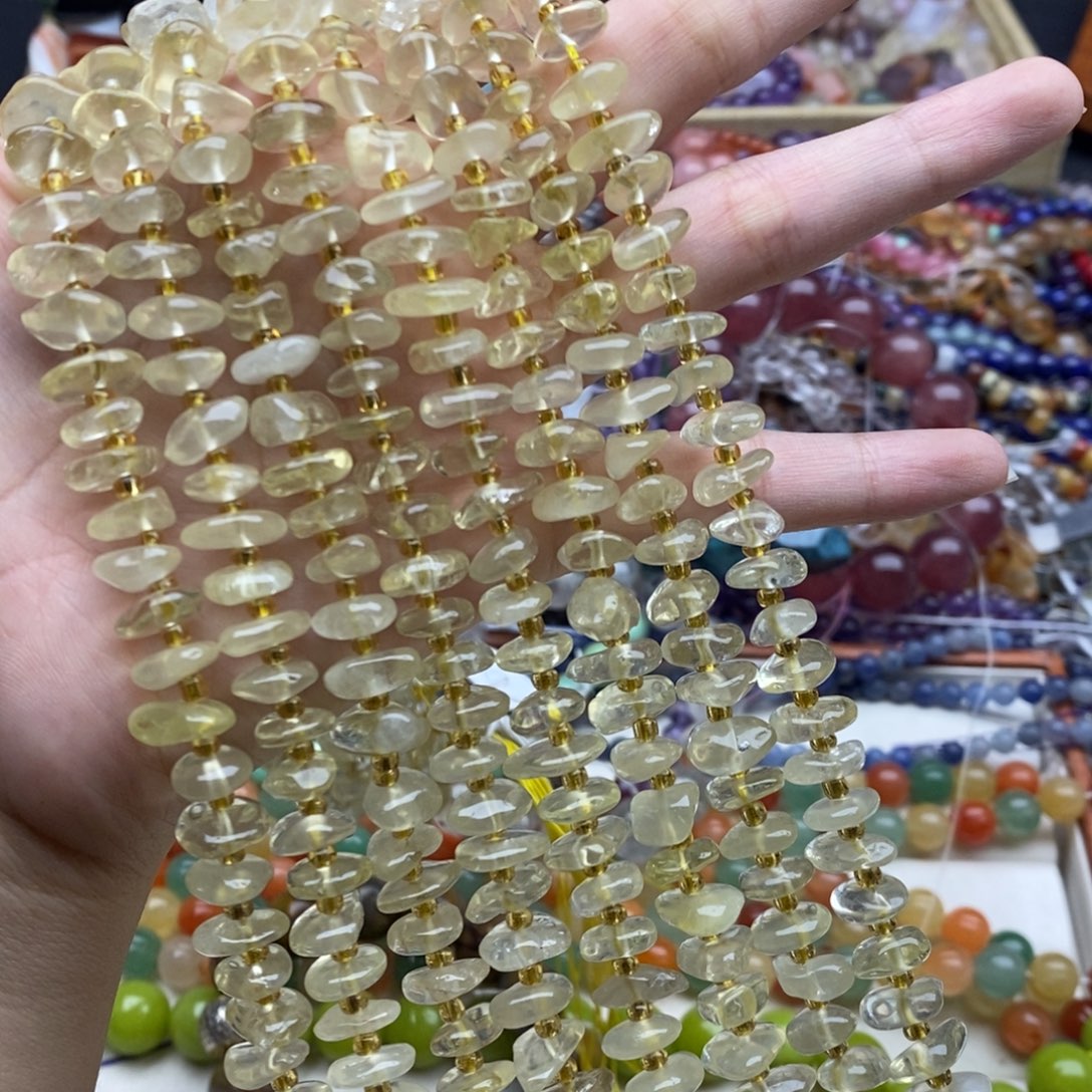 玛瑙/玉髓未镶嵌珠宝半成品一条纯天然柠檬黄水晶中孔隔片