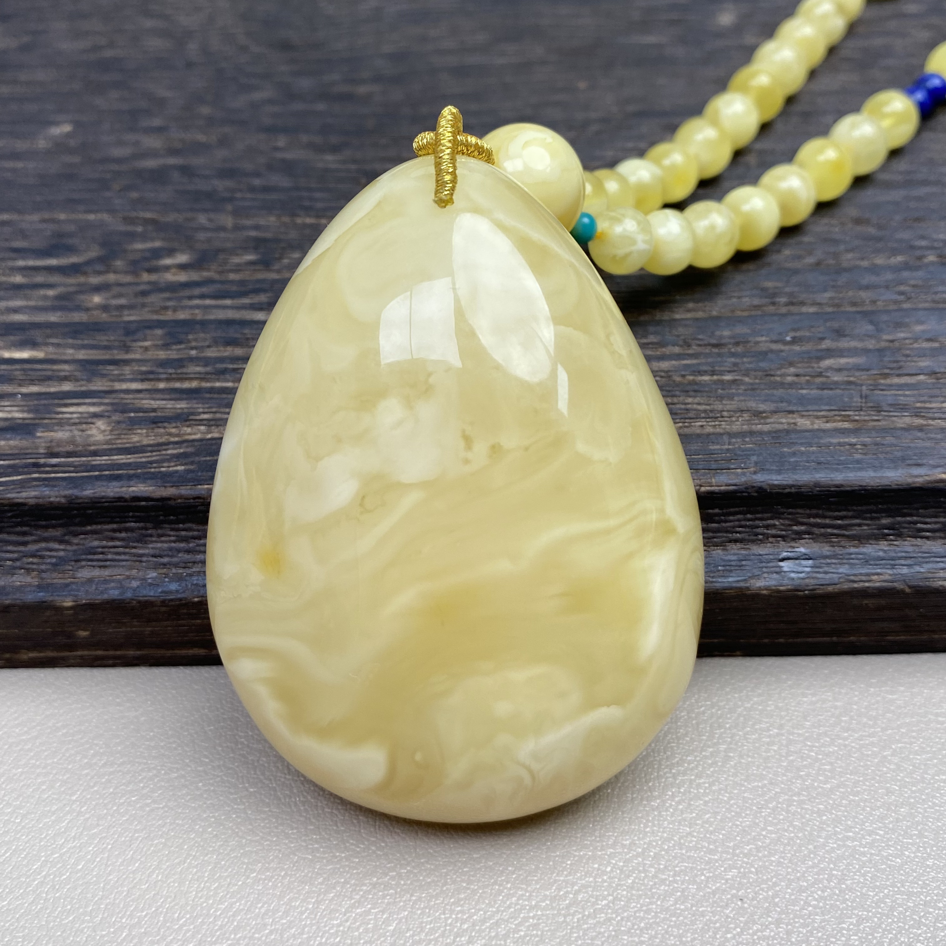 32.2克57×43×22.5天然俄料浓蜡妖花蜜蜡水滴无事牌平安扣藏扣