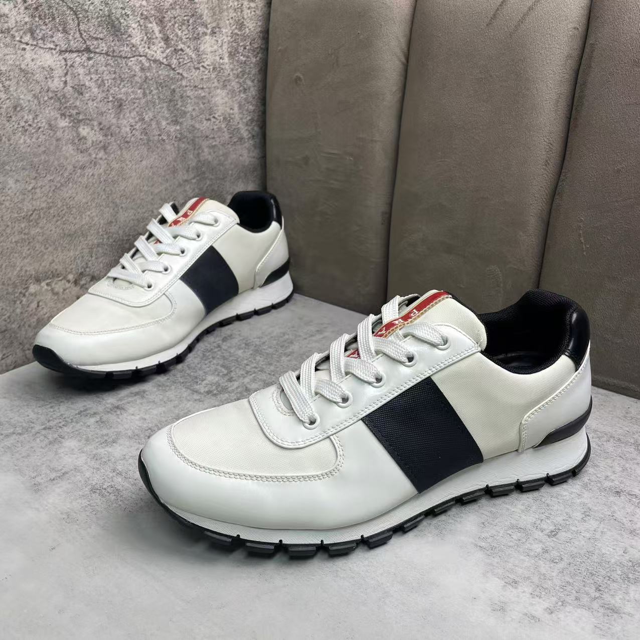 95新 Prada/普拉达 白色帆布网面黑色织带百搭休闲运动鞋/41码