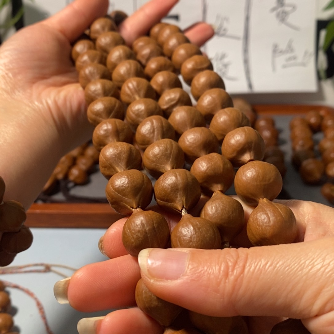 橄榄核手串9161精品卜挂蒜头铁核鸡血红54+2颗